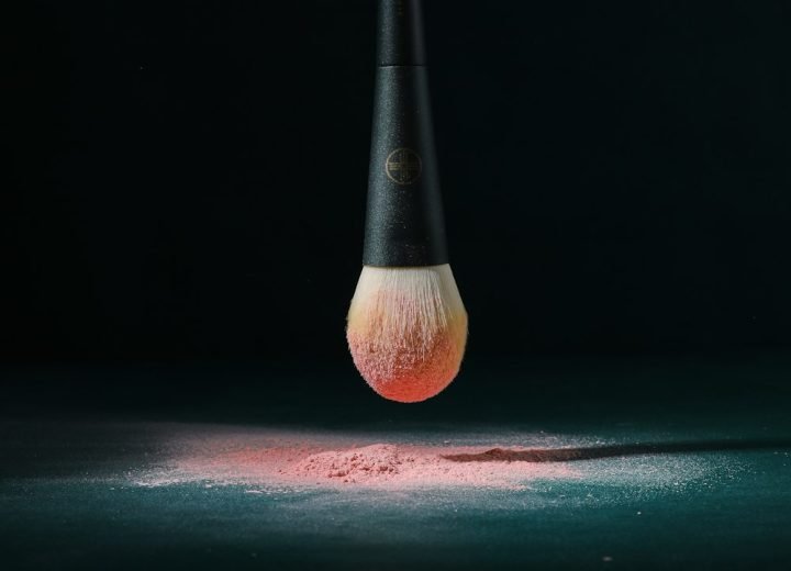 a close up of a makeup brush on a table